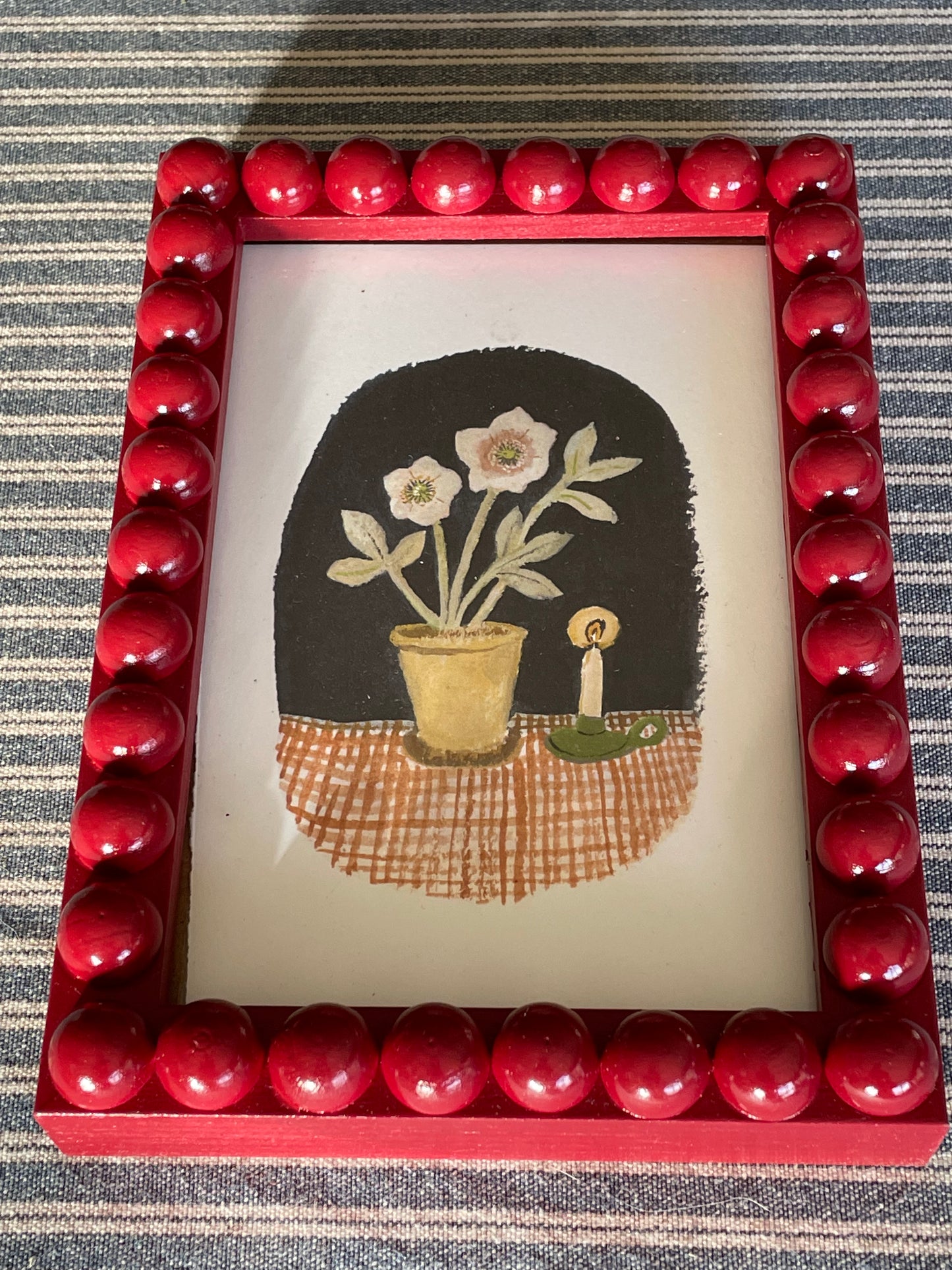 Berry wooden Bobbin Bobble Frame with flower and candle print.