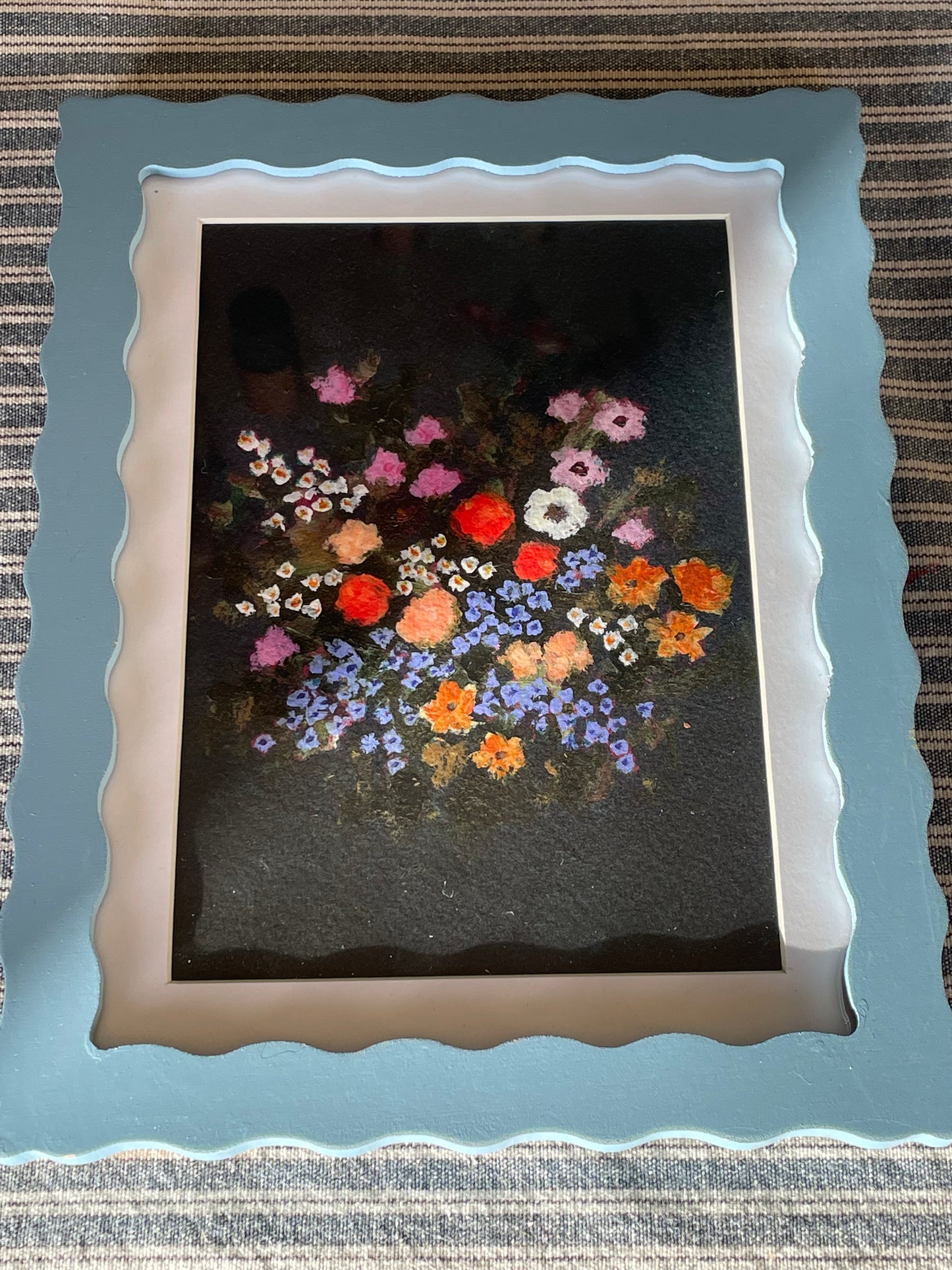 Blue wavy frame with Brittany Smith wildflower print.