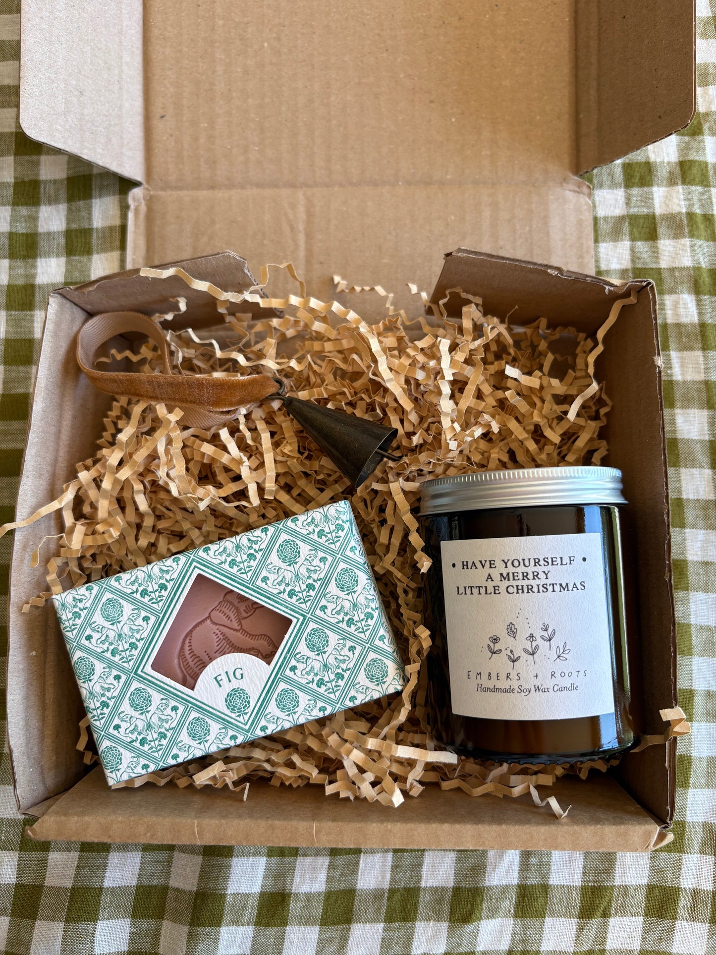 Christmas Gift box with a candle, soap and decorative bell tree item