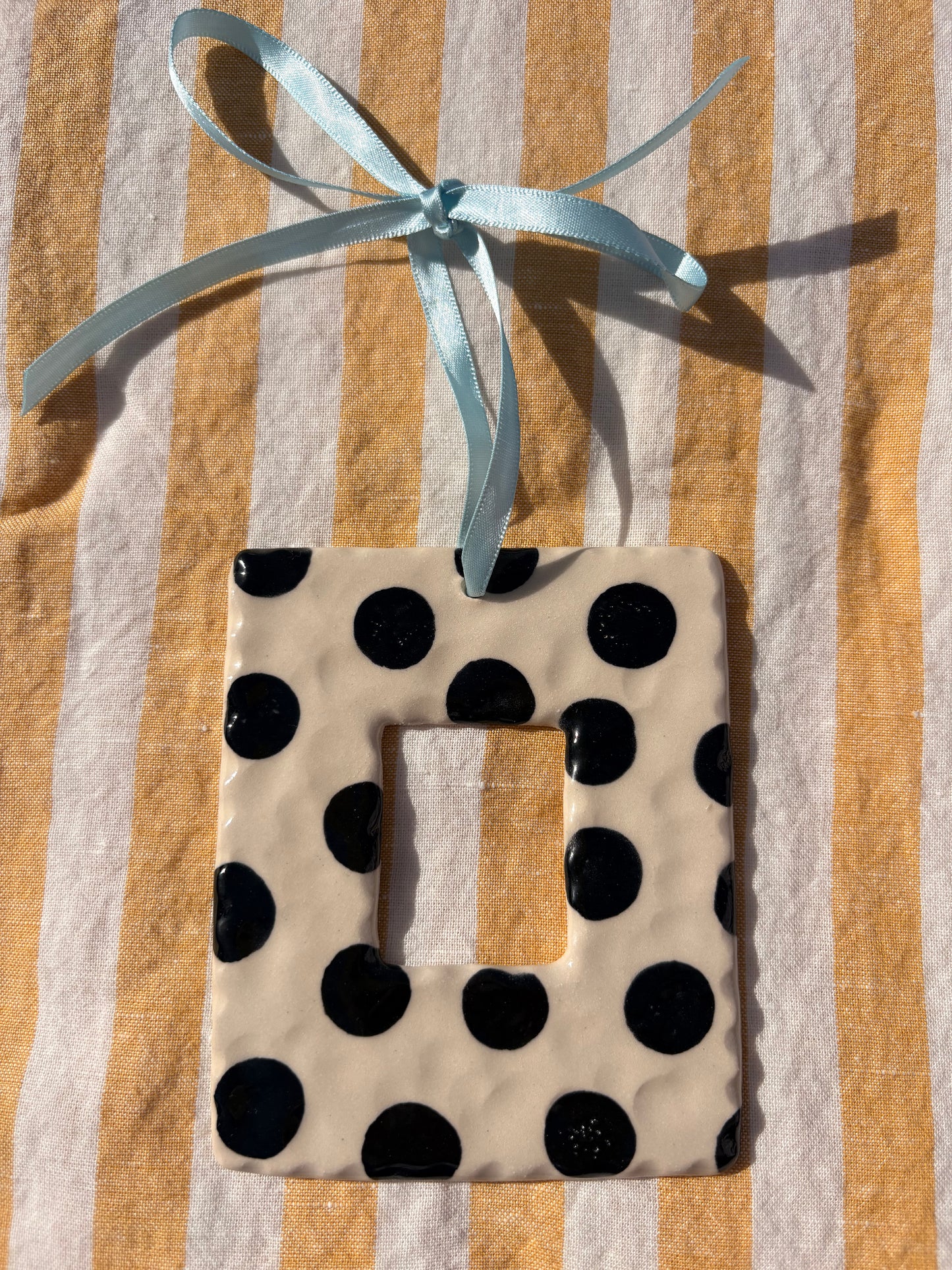 Black and white stonewear photo frame by Ruth Wilde