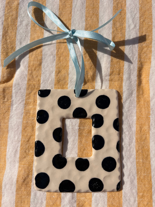Black and white stonewear photo frame by Ruth Wilde