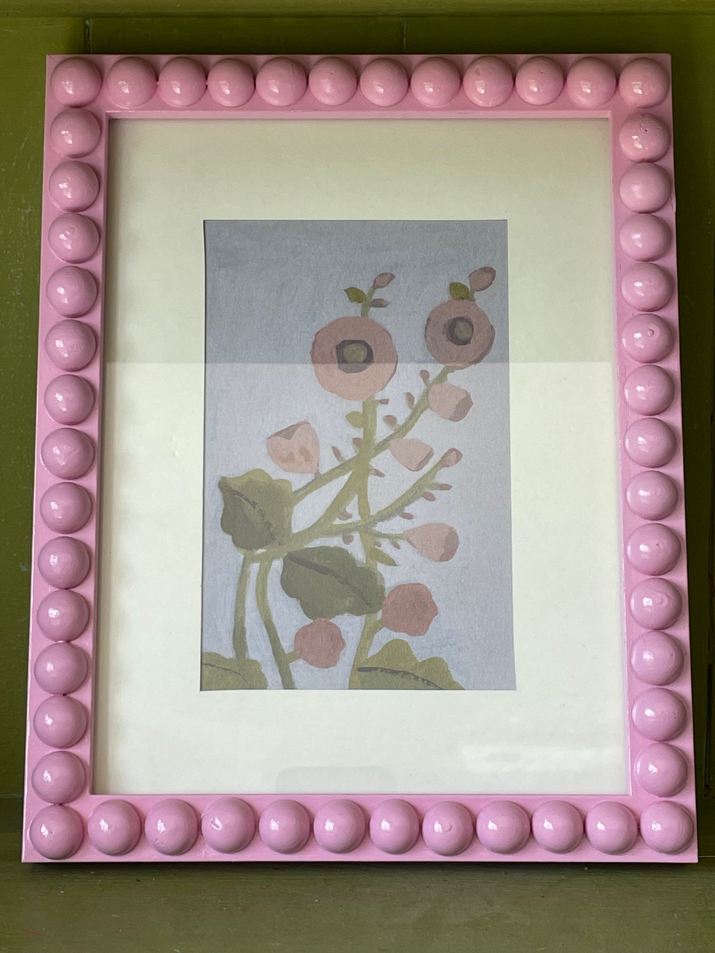 Handmade pink solid wooden Bobbin Frame with a Giclee Hollyhock print.