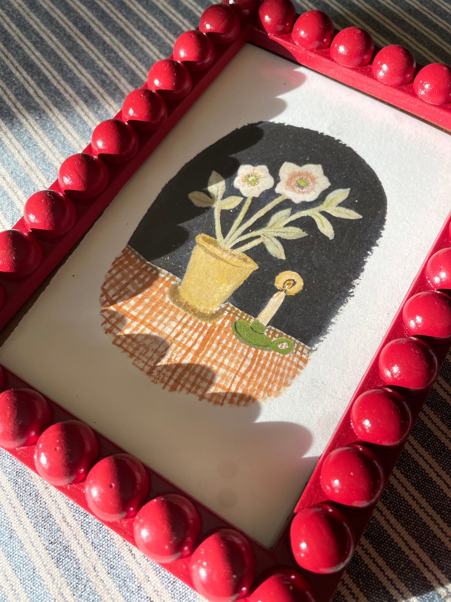 Berry wooden Bobbin Bobble Frame with flower and candle print.