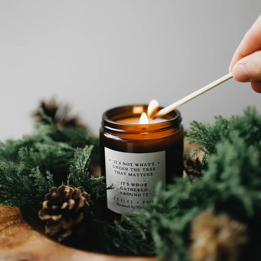 It's not what's under the Christmas Tree candle