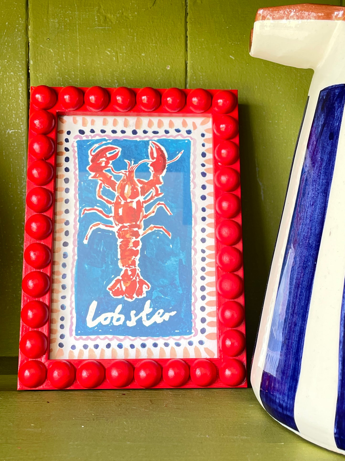 Red wooden Bobbin Frame with lobster print